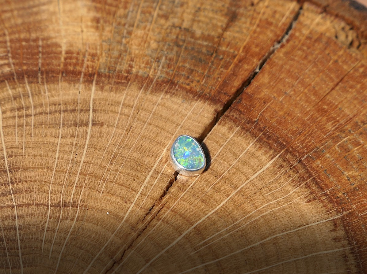 Silver tie tack with Lightning Ridge doublet