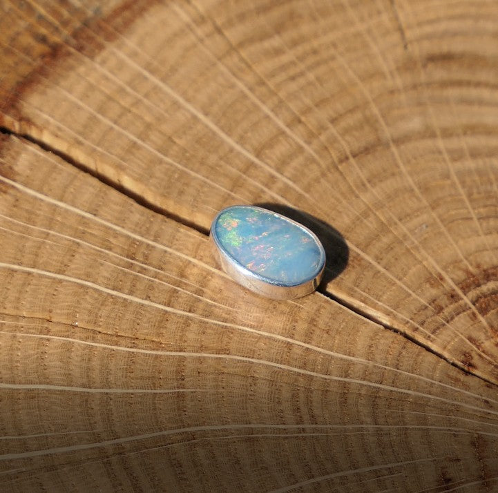 Silver tie tack with Coober Pedy opal.