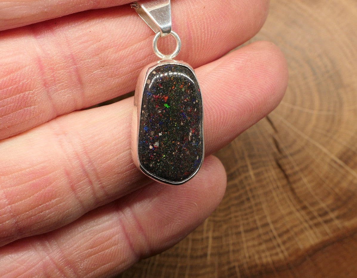 Silver opal pendant with a Honduran matrix opal