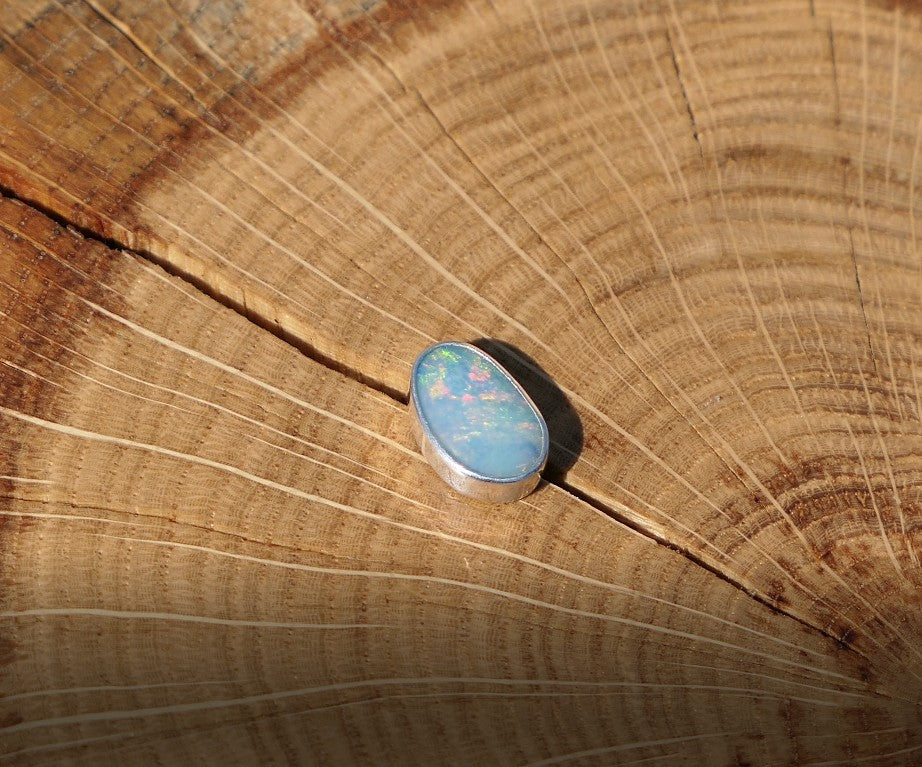 Silver tie tack with Coober Pedy opal.