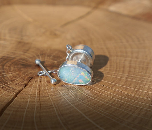 Silver tie tack with Coober Pedy opal.