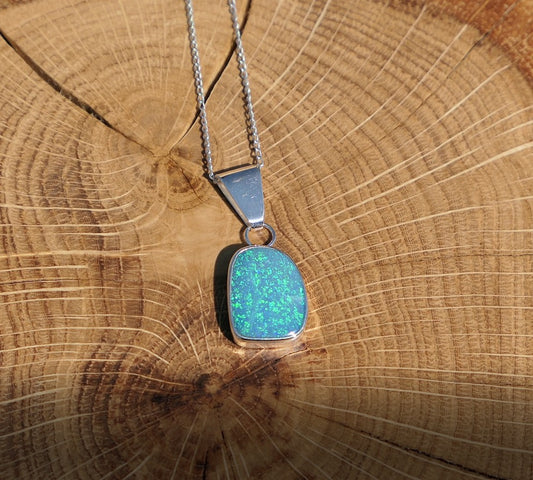 Silver opal pendant with a Coober Pedy doublet.