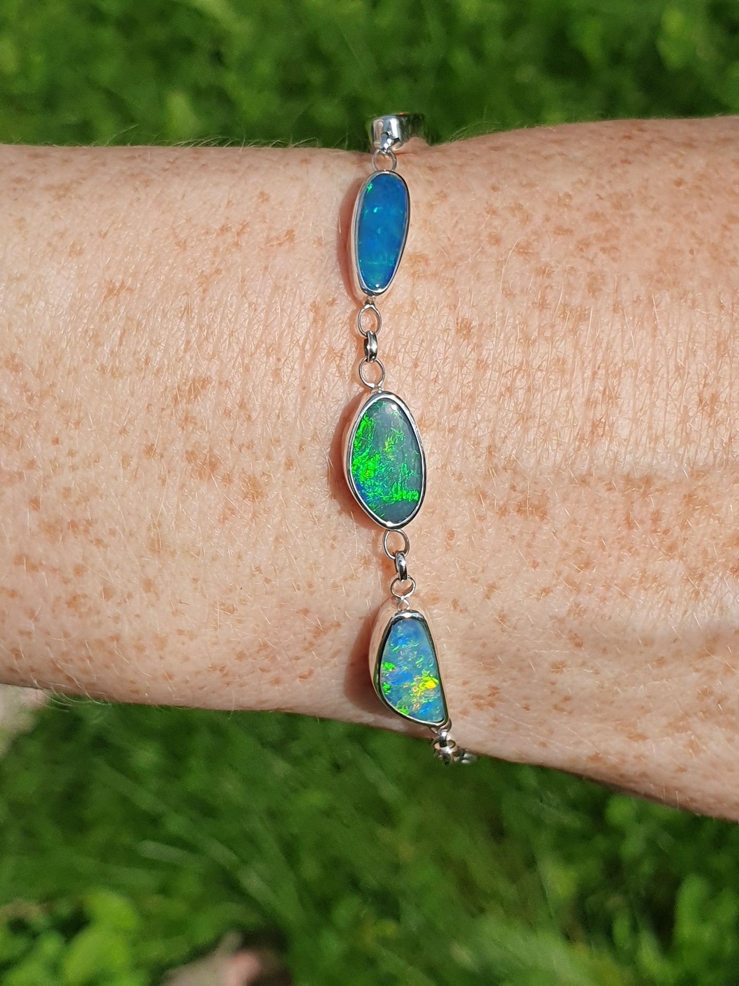 Silver opal bracelet, beautiful bright greens and blue opals