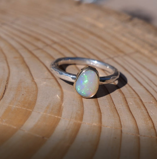 Lightning Ridge crystal opal ring with 18k gold bezel size P