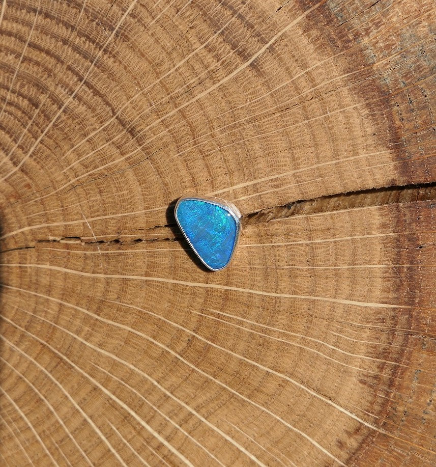 Silver tie tack with Coober Pedy opal.