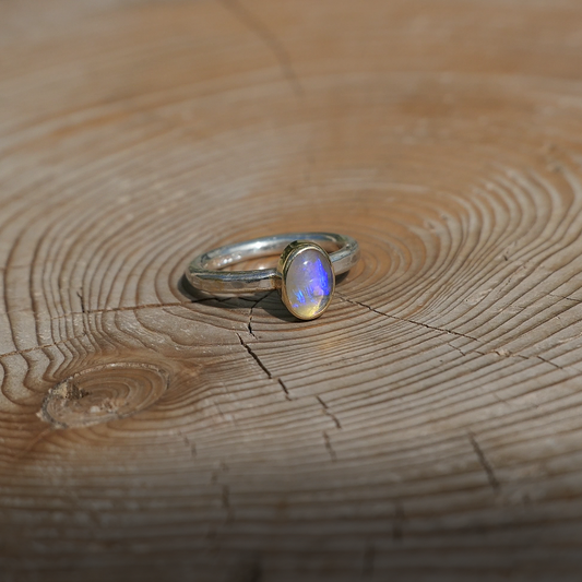 Silver opal ring with 18k gold bezel size L