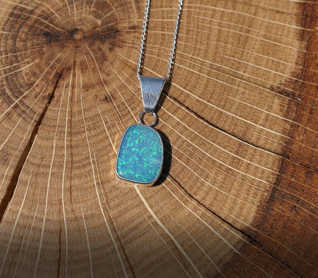 Silver opal pendant with a Coober Pedy doublet.