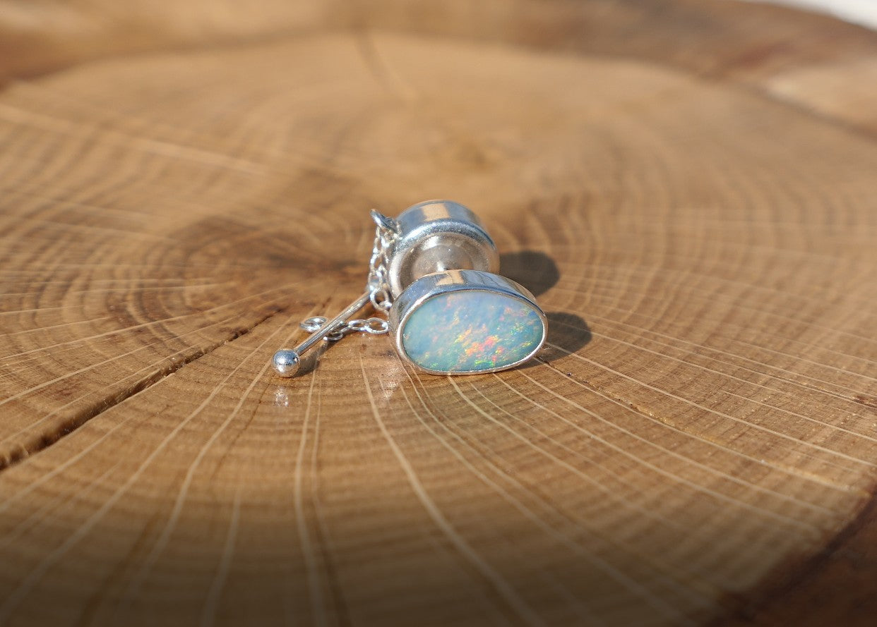Silver tie tack with Coober Pedy opal.