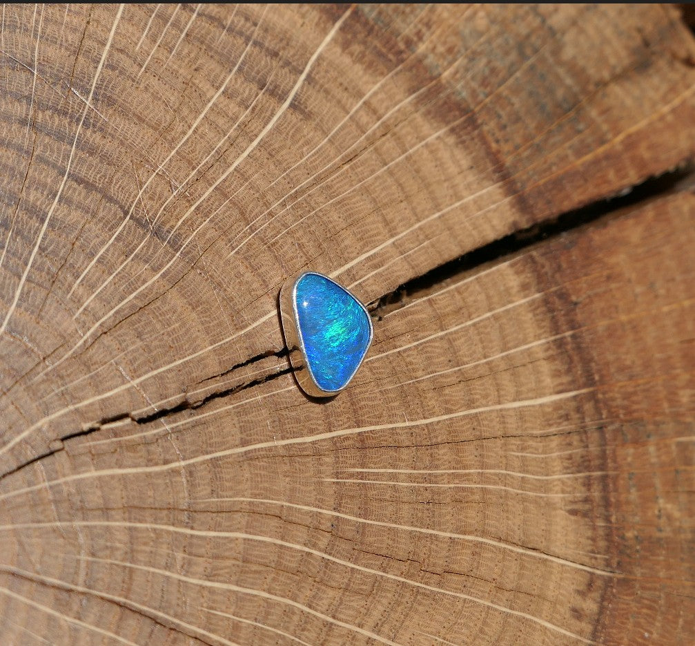 Silver tie tack with Coober Pedy opal.