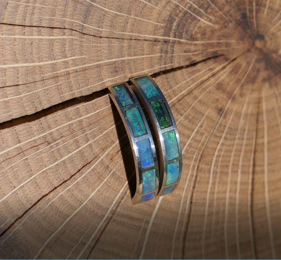 Silver hoop earrings with bright opal inlay