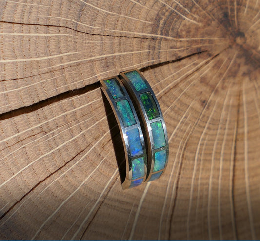Silver hoop earrings with bright opal inlay