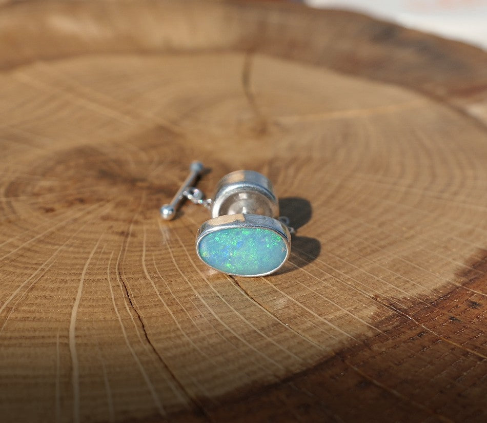 Silver tie tack with Coober Pedy opal.