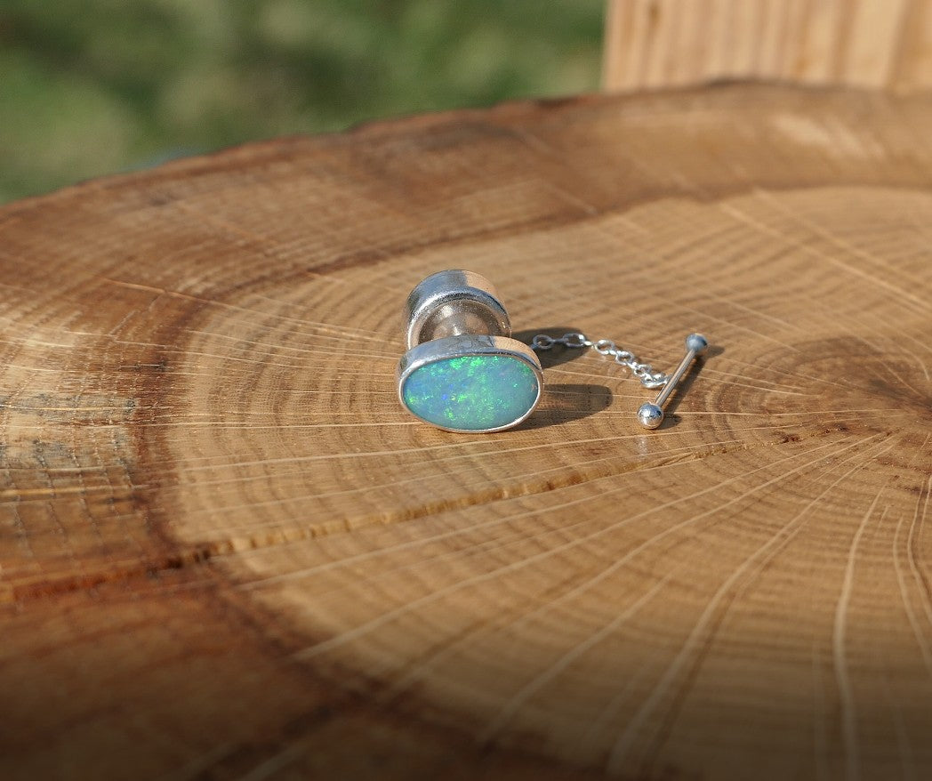 Silver tie tack with Coober Pedy opal.