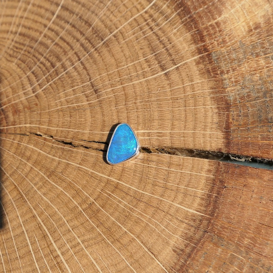 Silver tie tack with Coober Pedy opal.