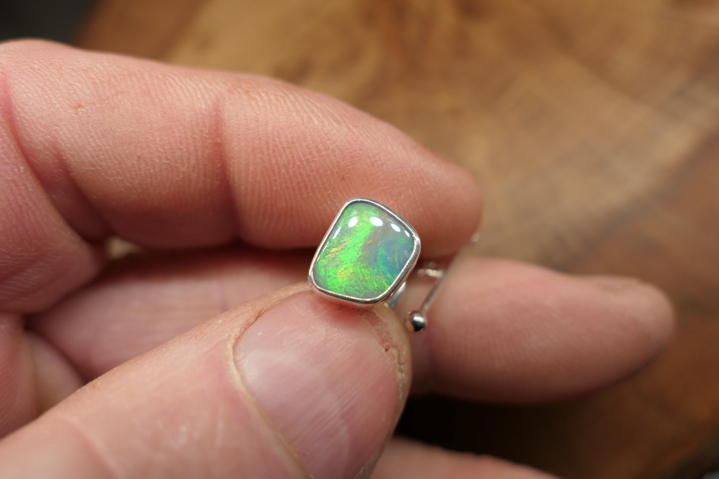 Silver tie tack with a Coober Pedy opal