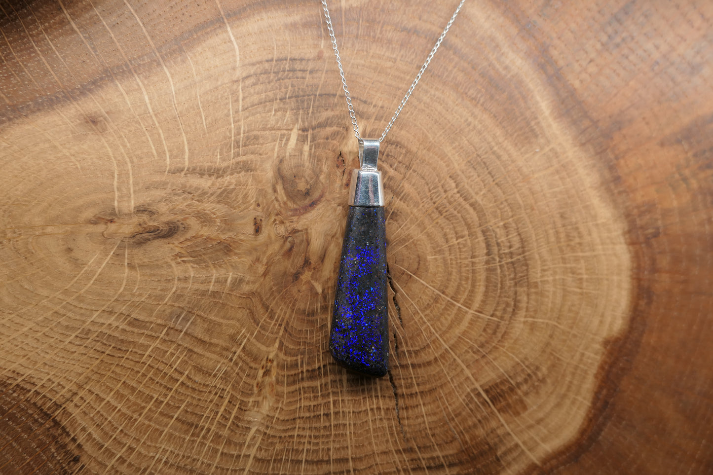 Silver opal pendant with a Queensland matrix opal