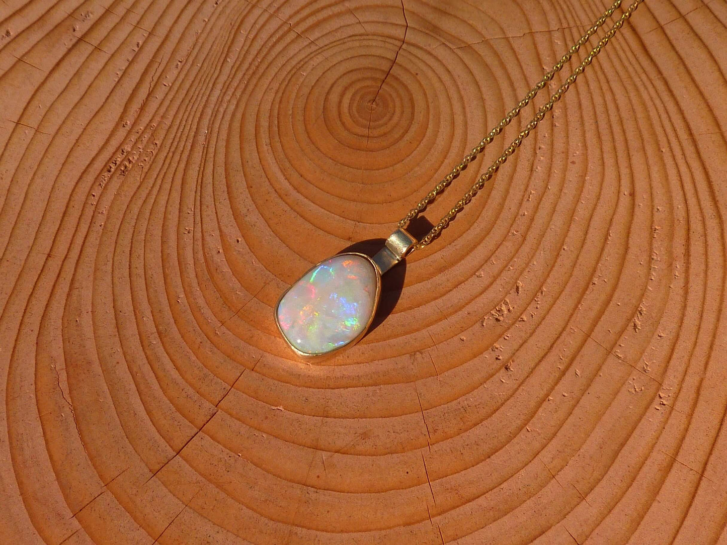 Gorgeous Coober Pedy solid opal set in 9ct gold bezel