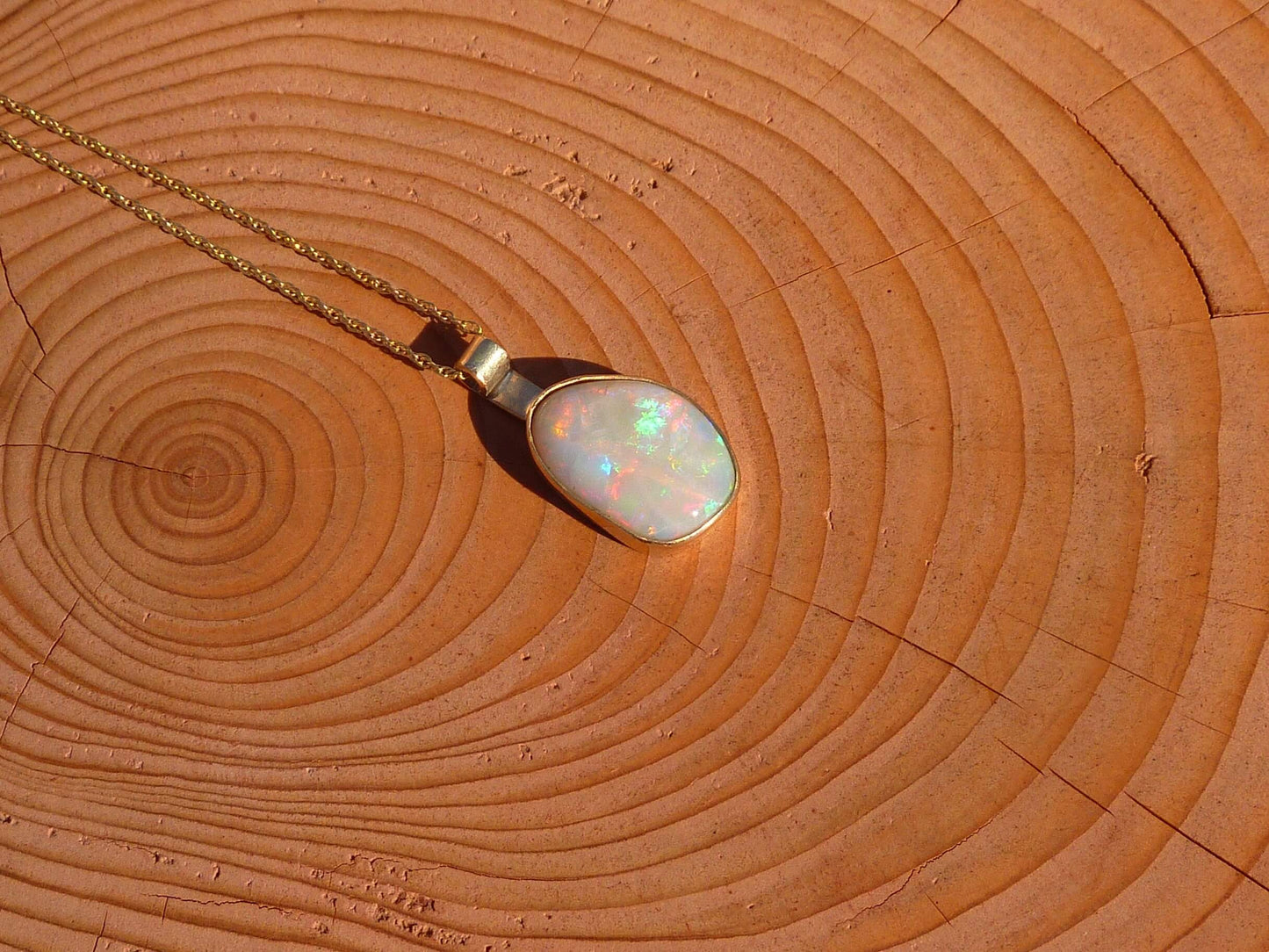 Gorgeous Coober Pedy solid opal set in 9ct gold bezel