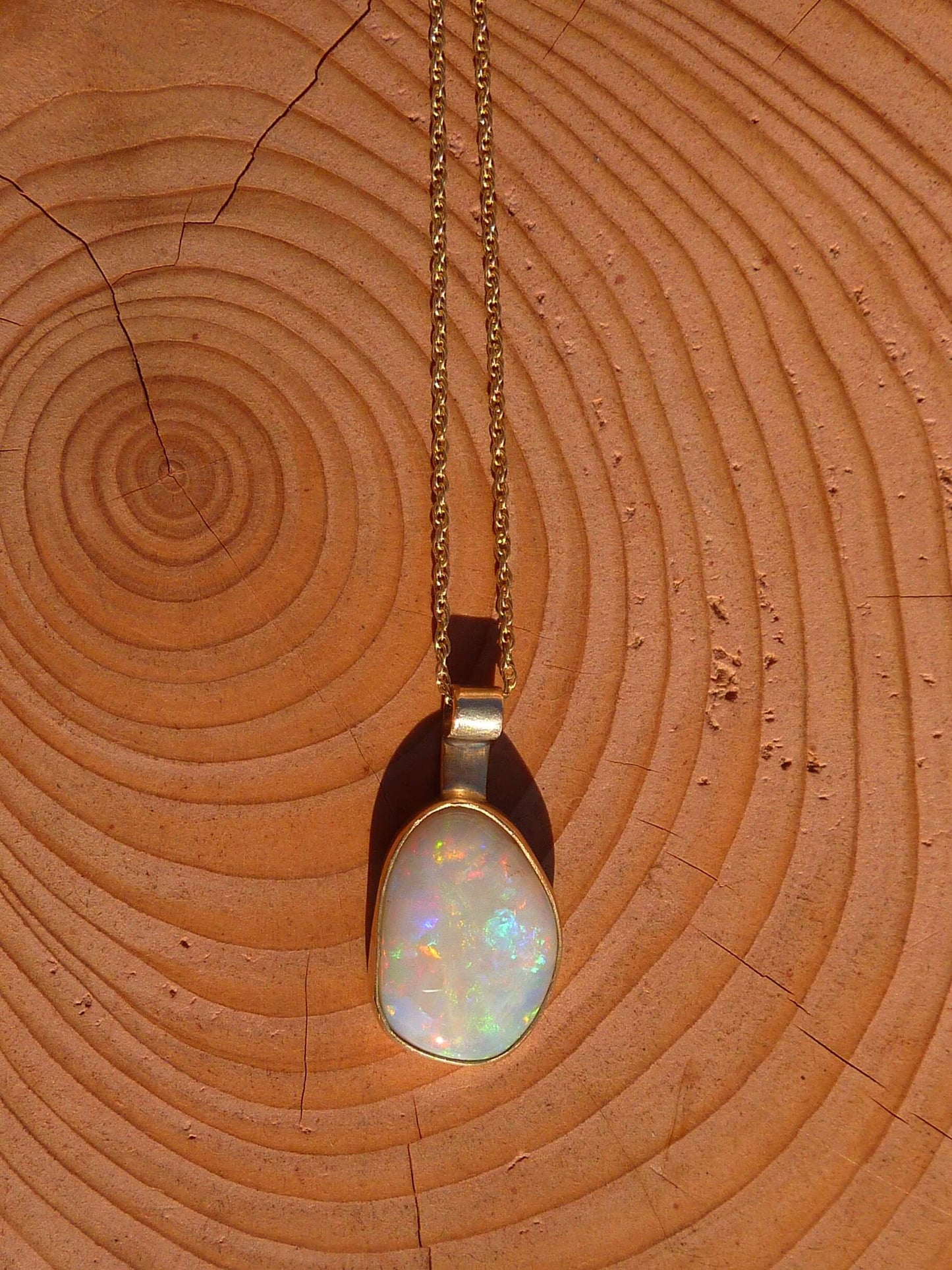 Gorgeous Coober Pedy solid opal set in 9ct gold bezel