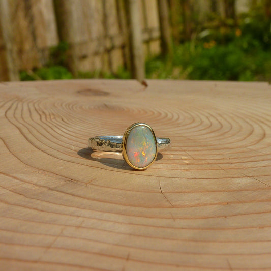 Silver opal ring with 18k gold bezel size J