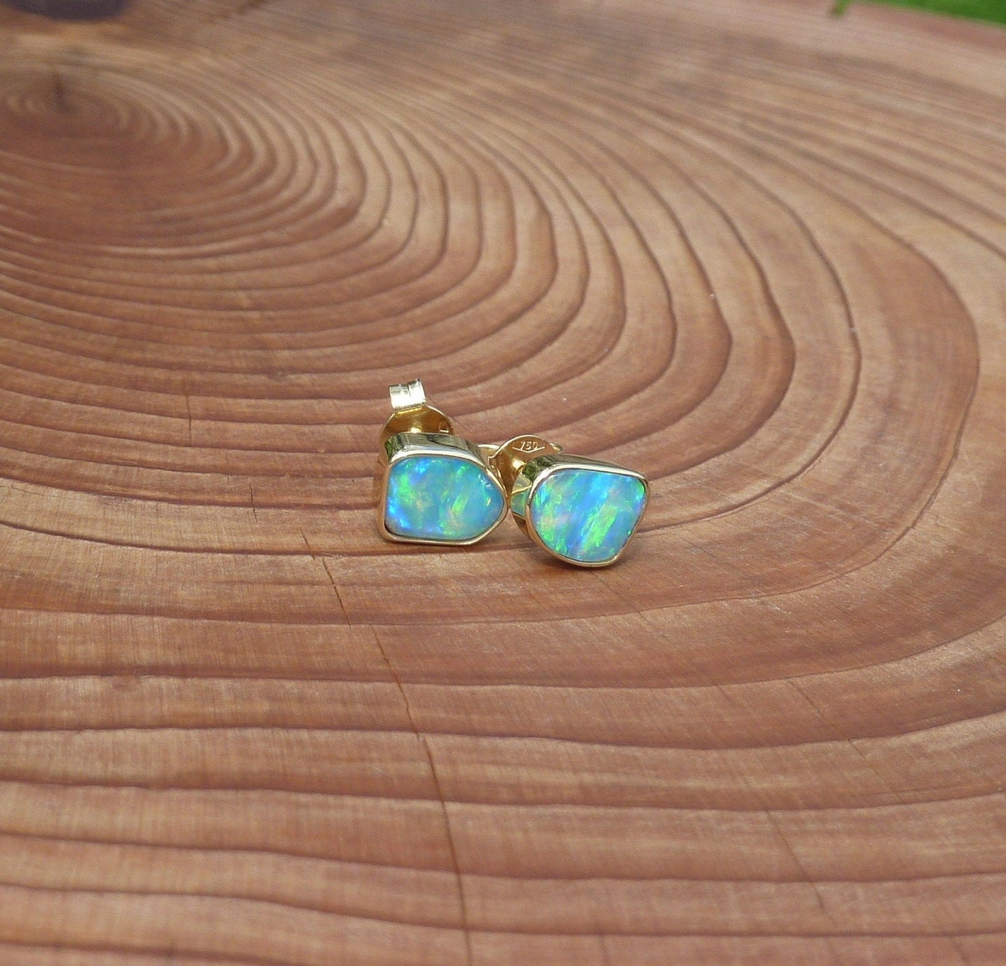 Matching 18k gold opal ear studs