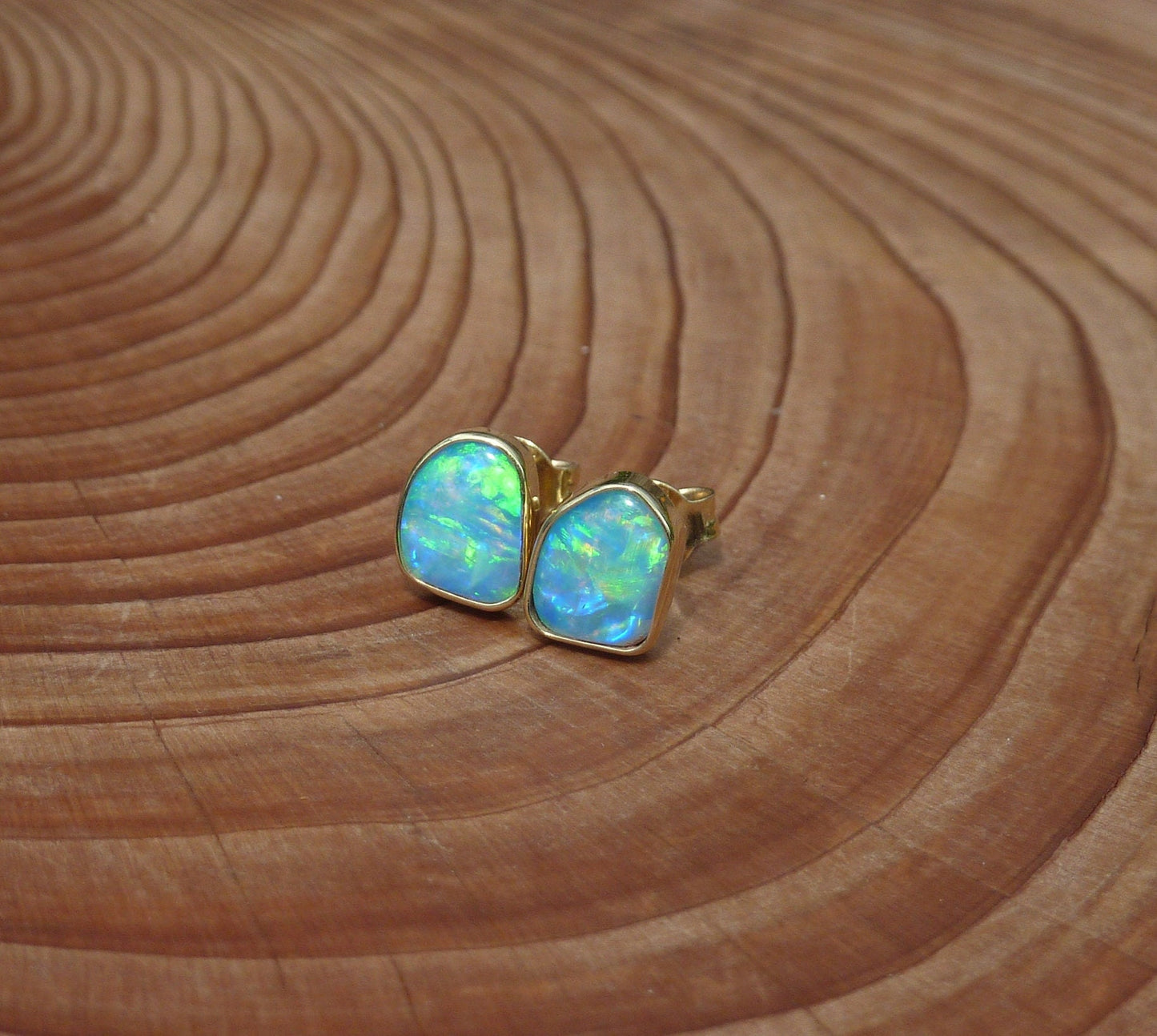 Matching 18k gold opal ear studs