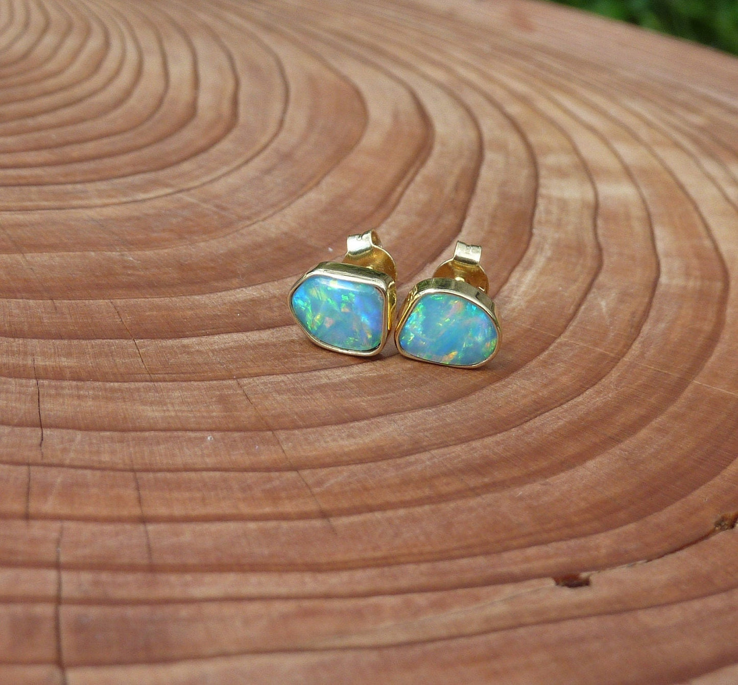 Matching 18k gold opal ear studs