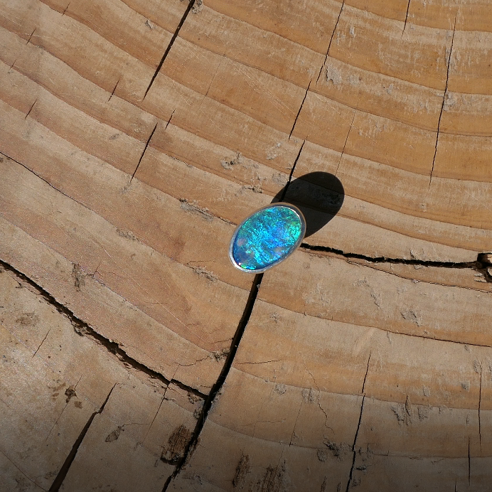 Silver tie tack with Coober Pedy opal.