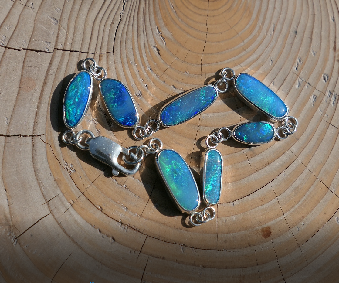 Silver opal bracelet, beautiful bright greens and blue opals