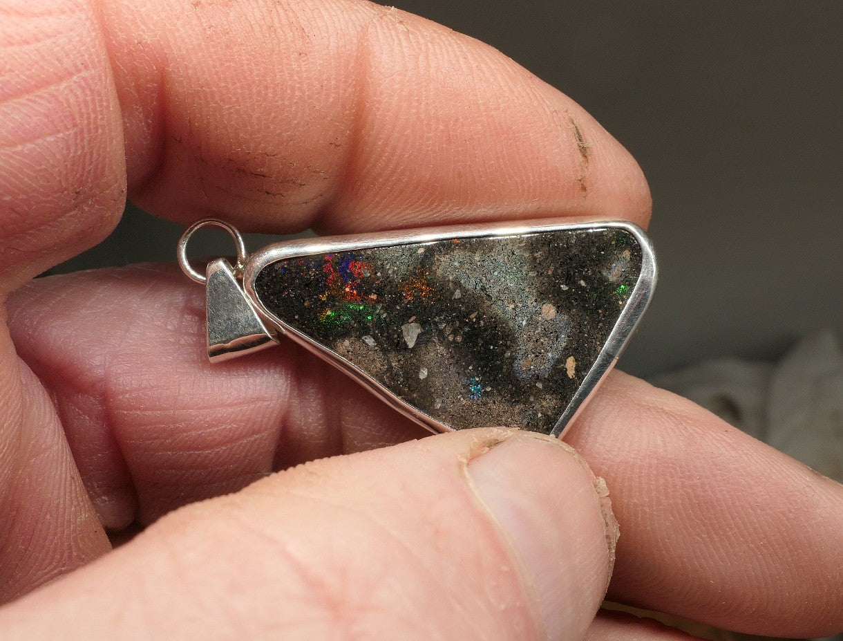 Double sided silver pendant with a Honduran matrix opal