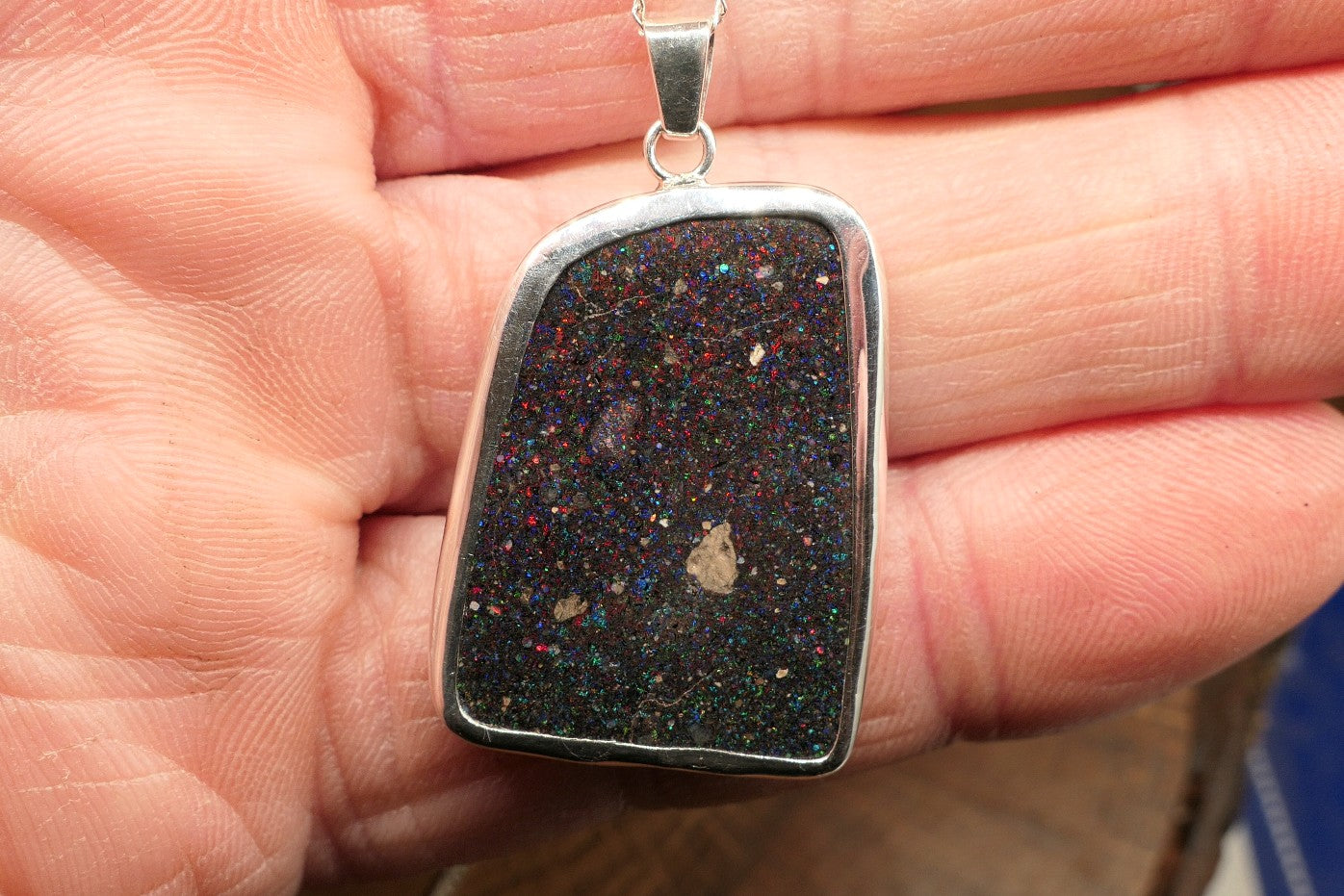 Double sided silver pendant with a Honduran matrix opal