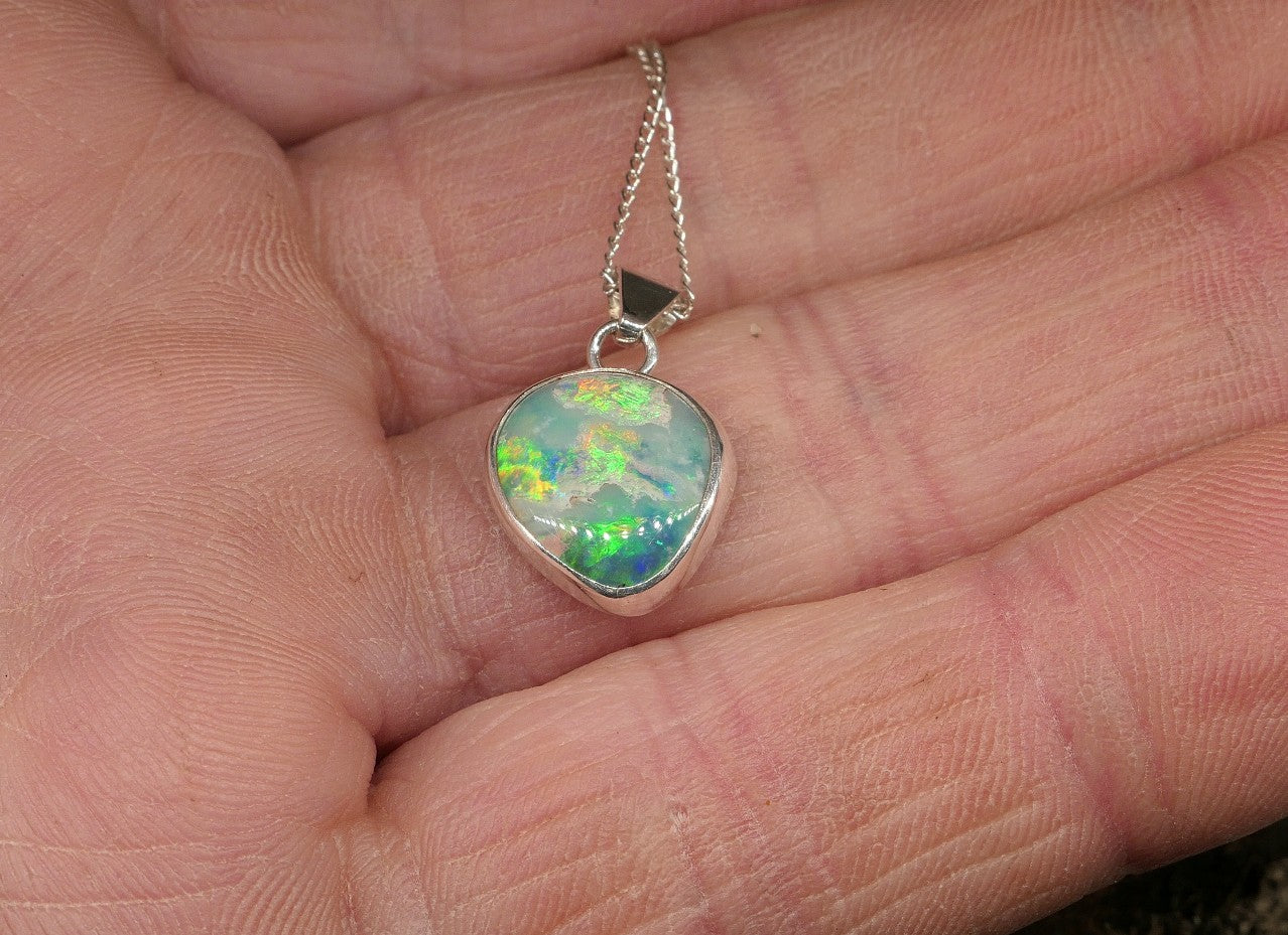 Opalised shell pendant