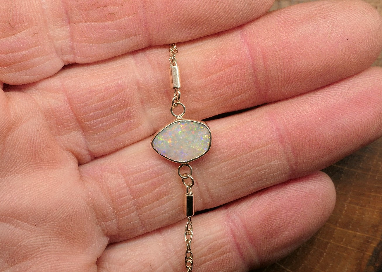 9k gold opal bracelet with a Lightning Ridge semi-black opal