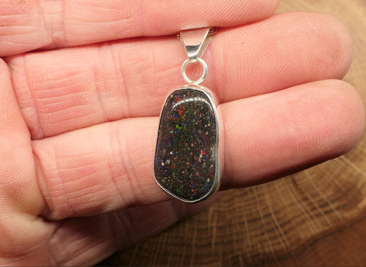 Silver opal pendant with a Honduran matrix opal