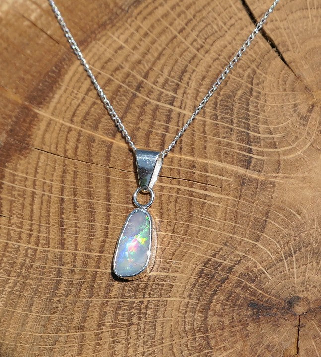 Silver opal pendant with a Mintabie solid opal