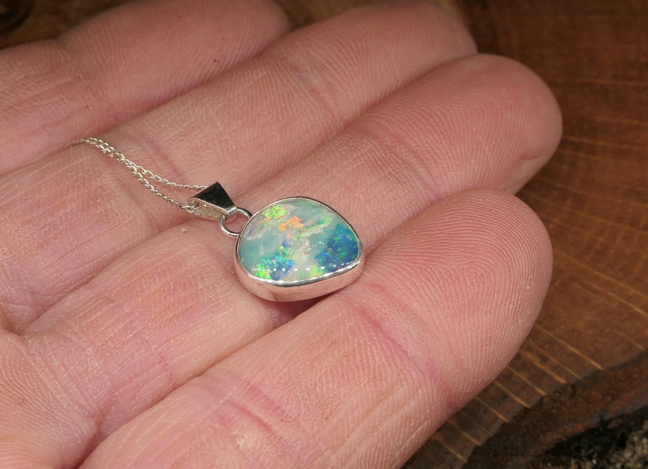 Opalised shell pendant