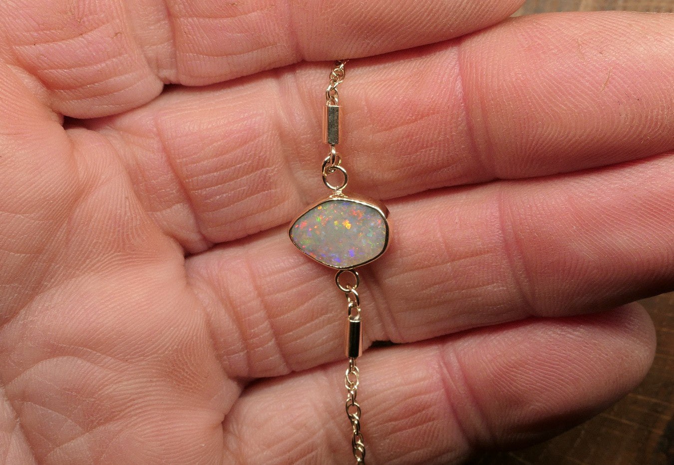 9k gold opal bracelet with a Lightning Ridge semi-black opal