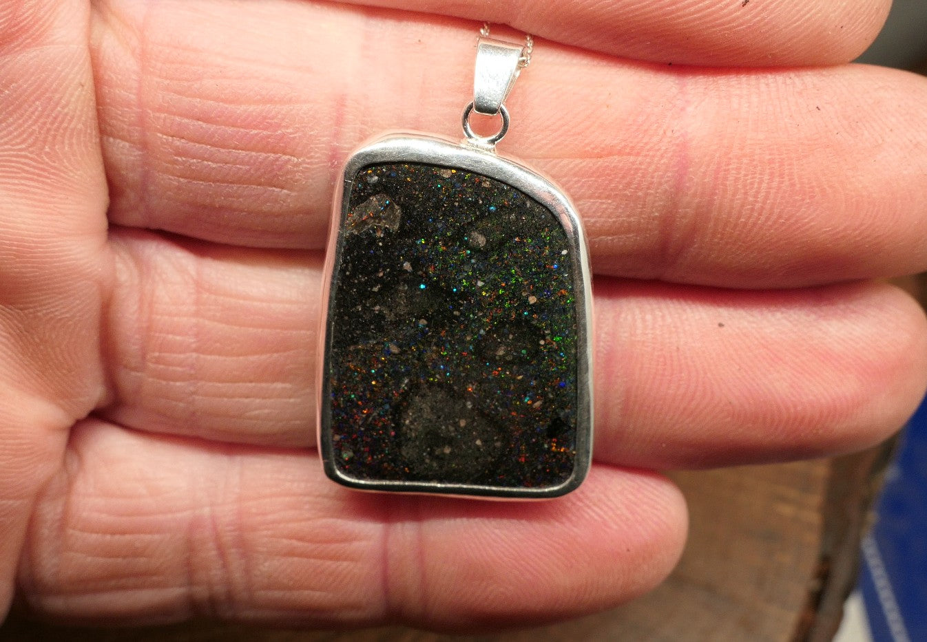 Double sided silver pendant with a Honduran matrix opal