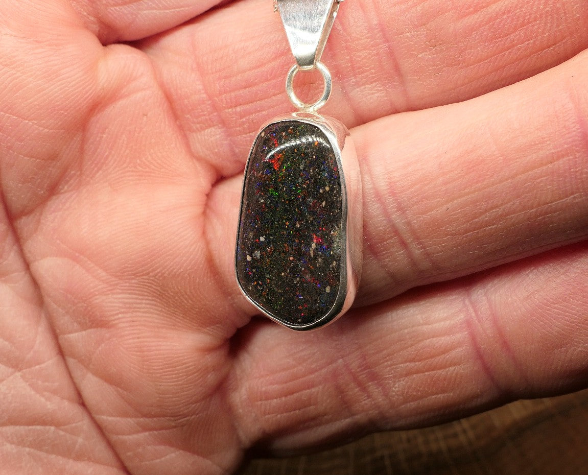 Silver opal pendant with a Honduran matrix opal