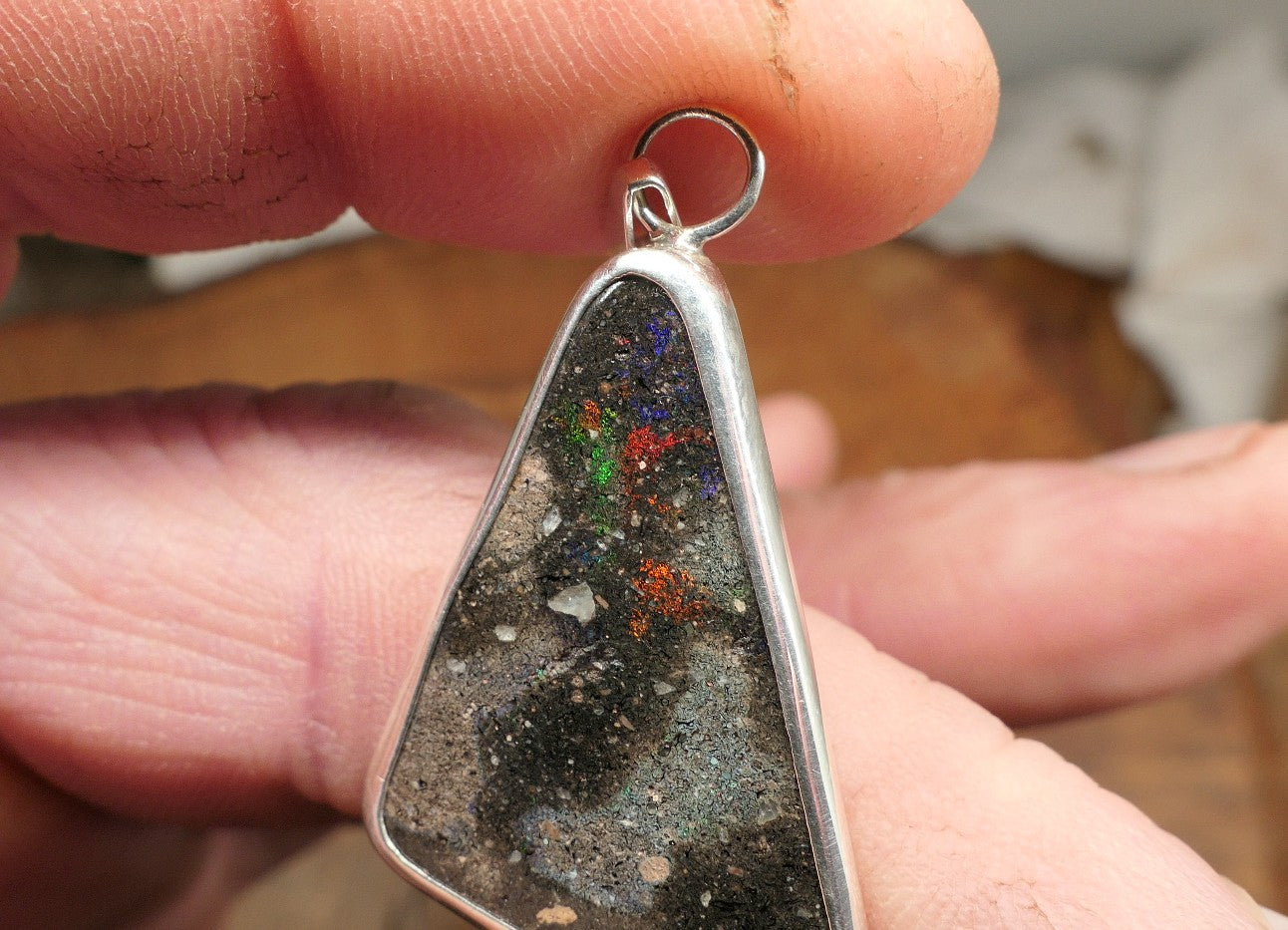 Double sided silver pendant with a Honduran matrix opal