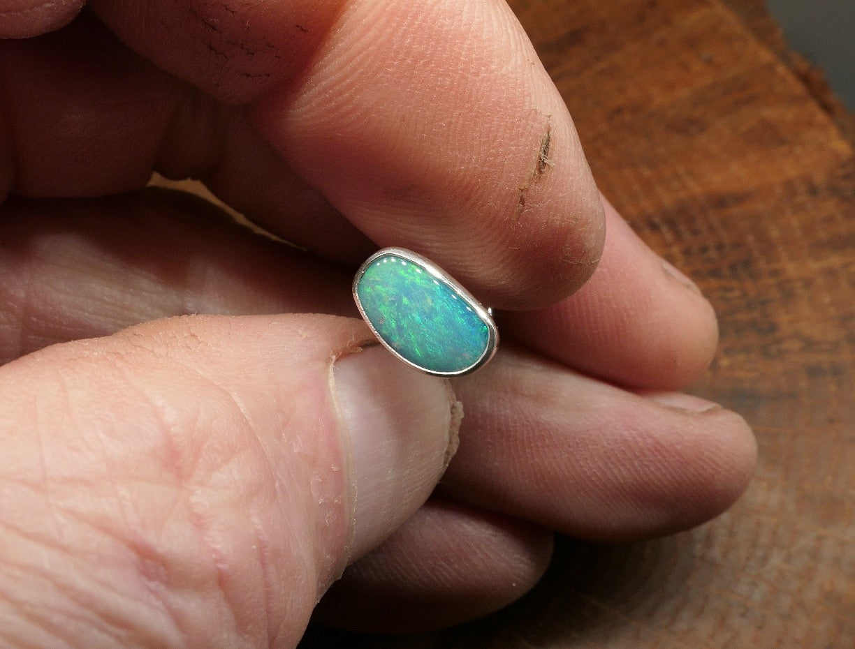 Silver tie tack with a Coober Pedy opal