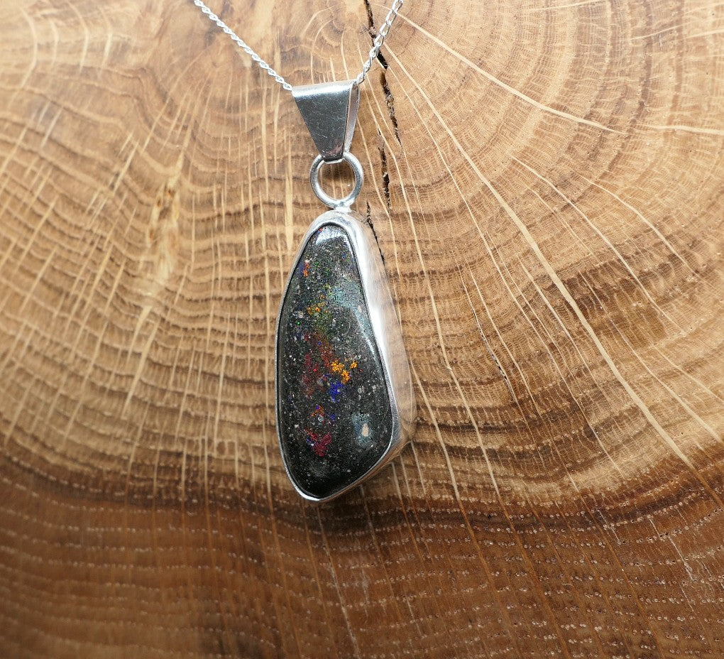 Silver opal pendant with a Honduran matrix opal