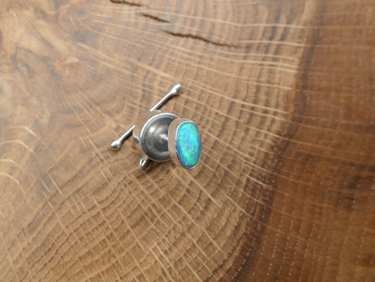 Silver tie tack with a Coober Pedy opal