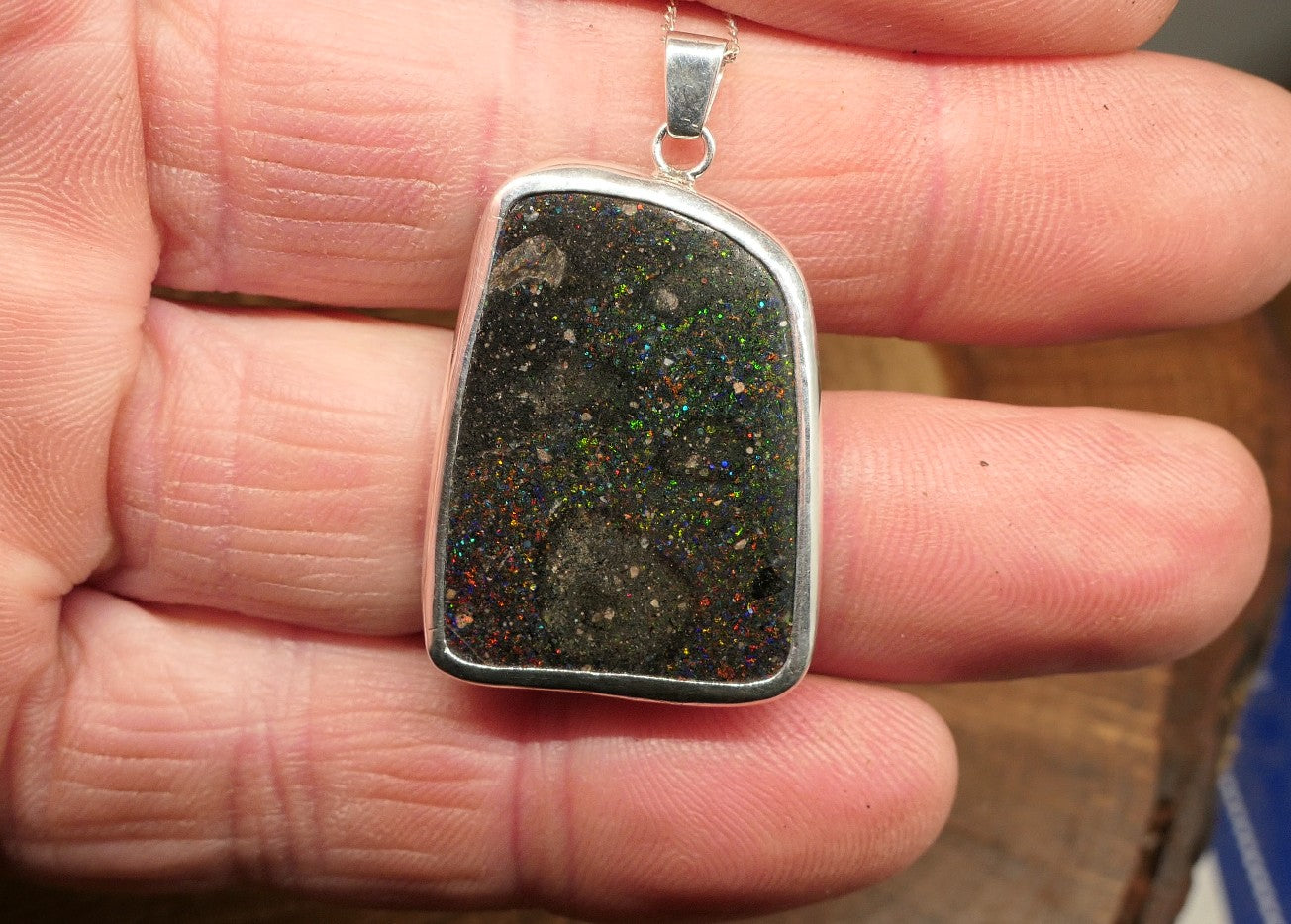 Double sided silver pendant with a Honduran matrix opal