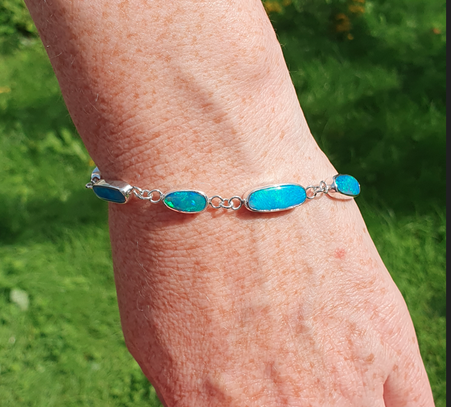 Silver opal bracelet, beautiful bright greens and blue opals