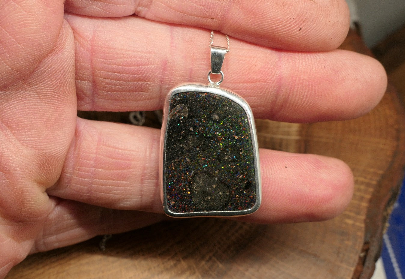 Double sided silver pendant with a Honduran matrix opal