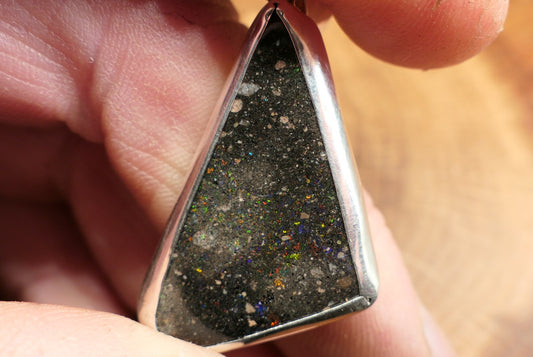 Double sided silver pendant with a Honduran matrix opal