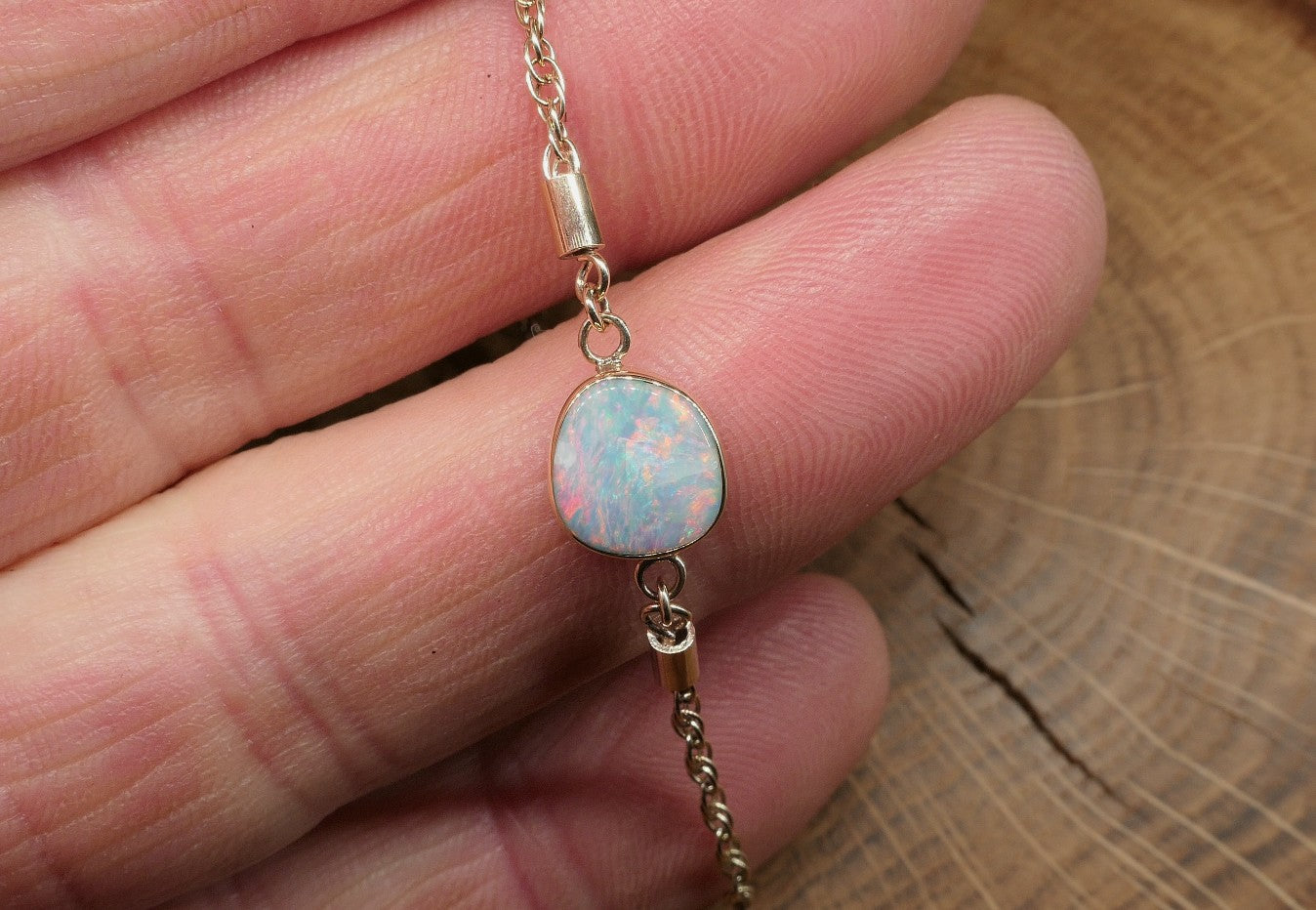 9k gold opal bracelet with a Mintubi solid opal.