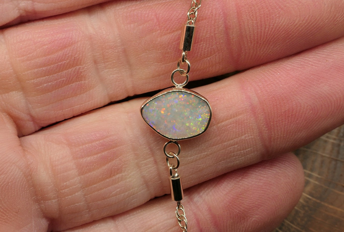 9k gold opal bracelet with a Lightning Ridge semi-black opal