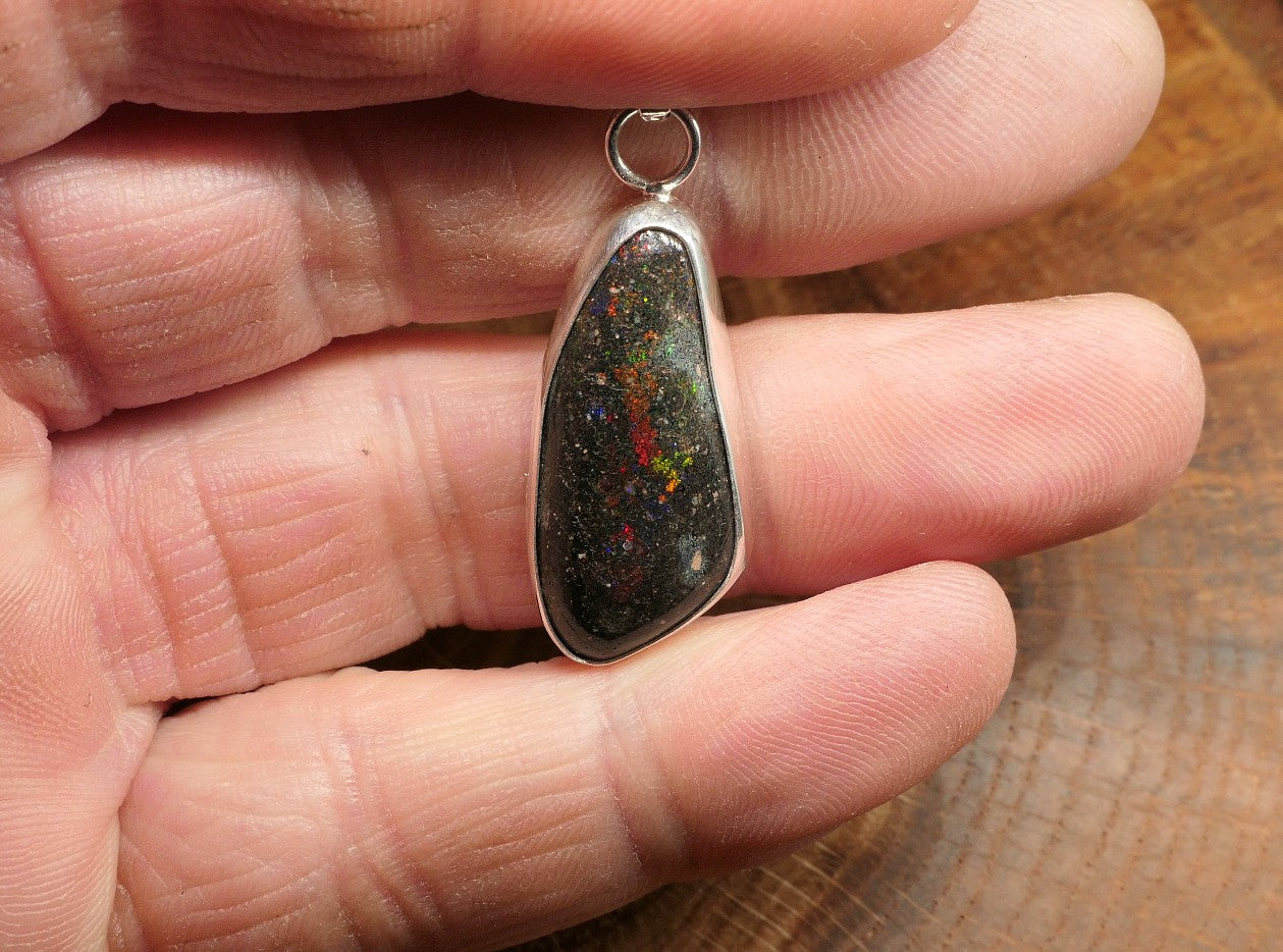 Silver opal pendant with a Honduran matrix opal